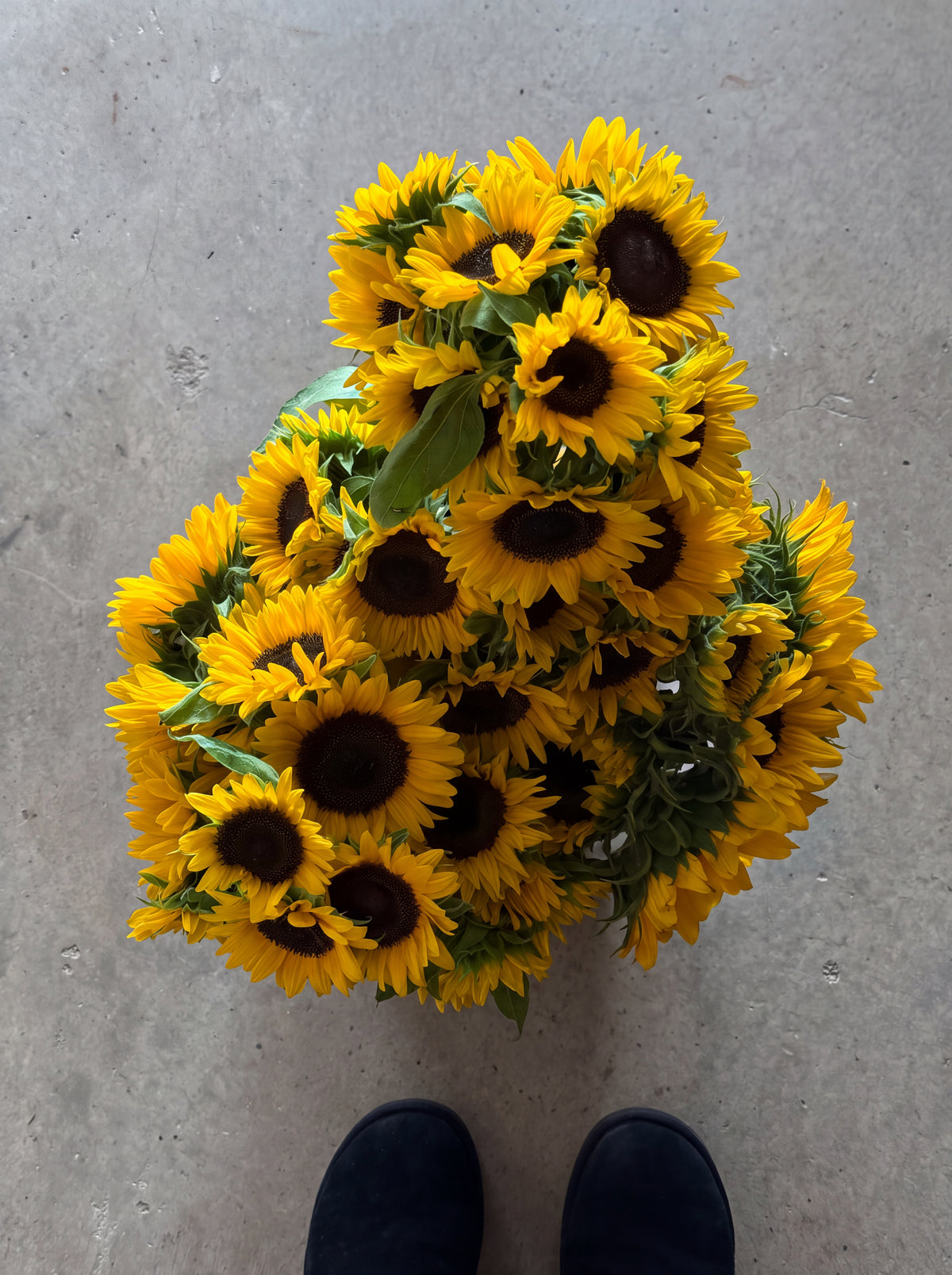 Your Doctor Said More Vitamin D, detail view 3. Sculptural sunflower vase arrangement in layered yellow, brown and green.