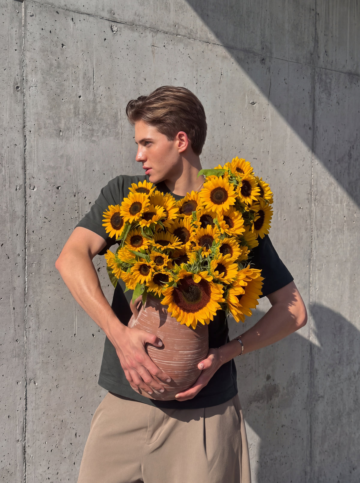 Your Doctor Said More Vitamin D by WildMoon Flowers, Toronto. Sculptural sunflower vase arrangement in layered yellow, brown and green.