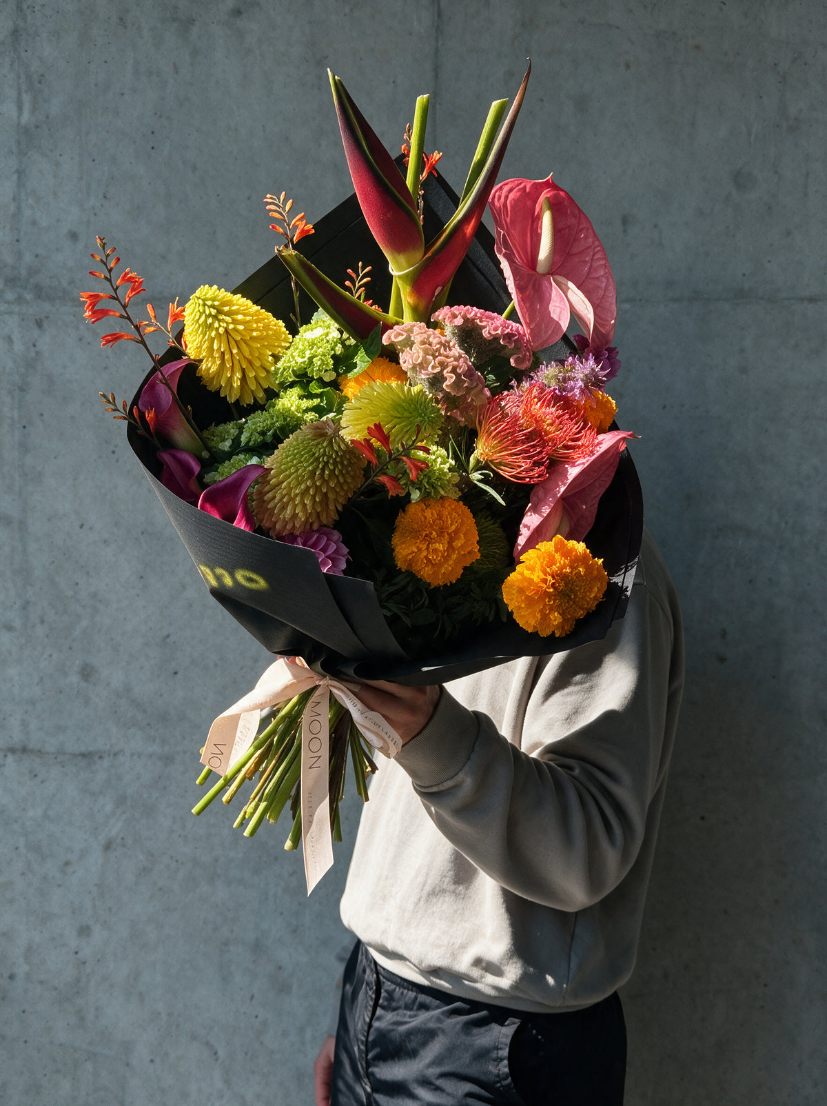 HEAT WAVE by WildMoon Flowers, Toronto. Tropical bouquet in hot pink, orange, yellow and acid green.